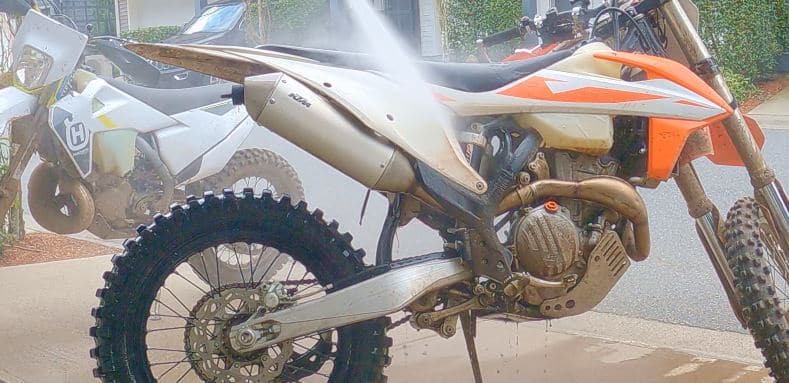 White Dirt Bike Plastics with a Pressure Washer